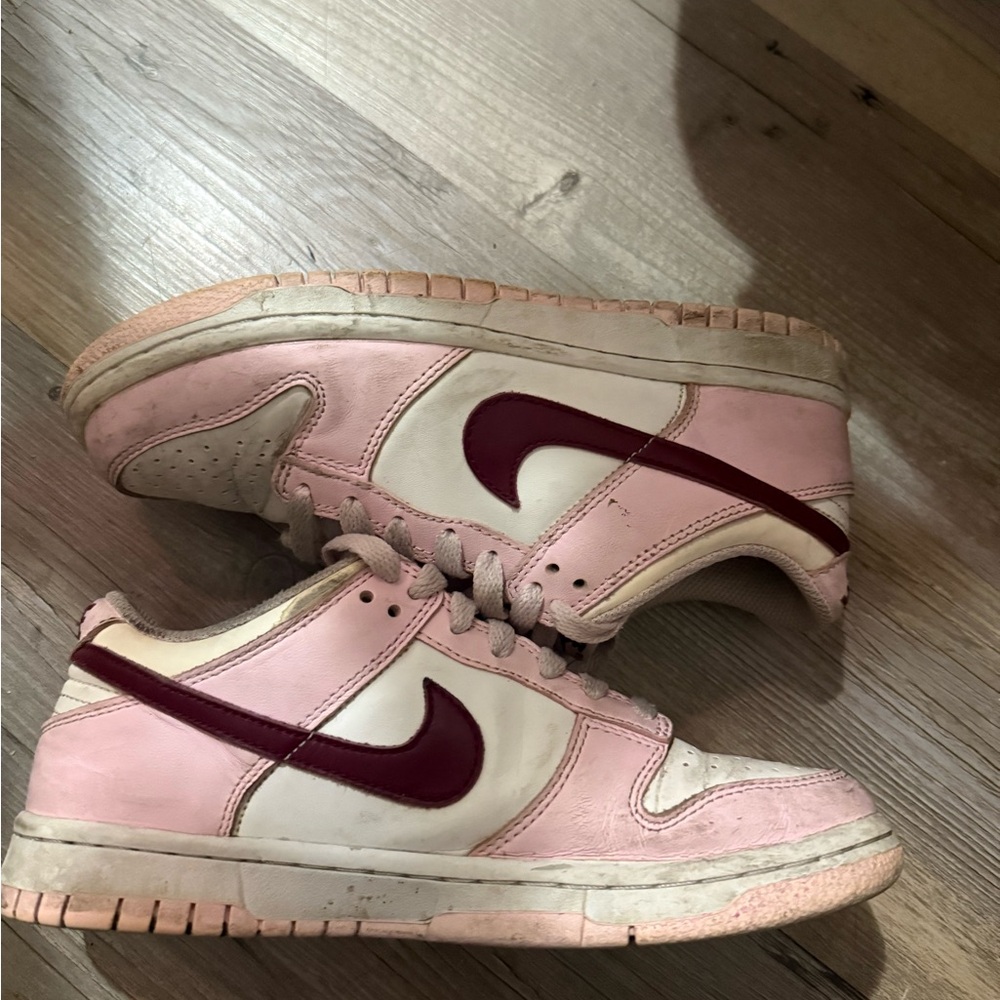 Nike Pink and White Sneakers with Red Swoosh